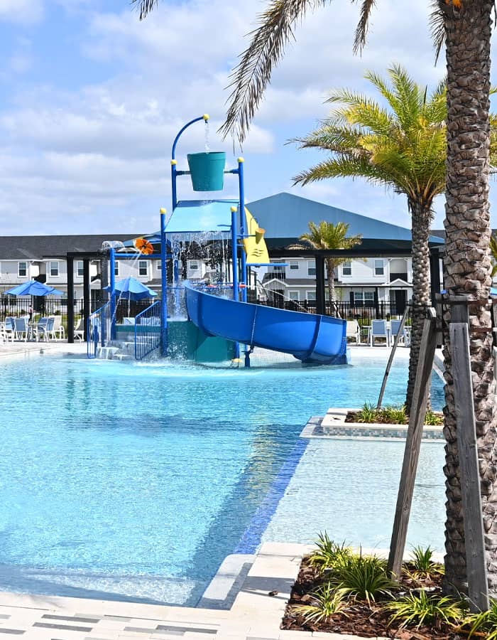 multi-level water playset in a resort-style swimming pool