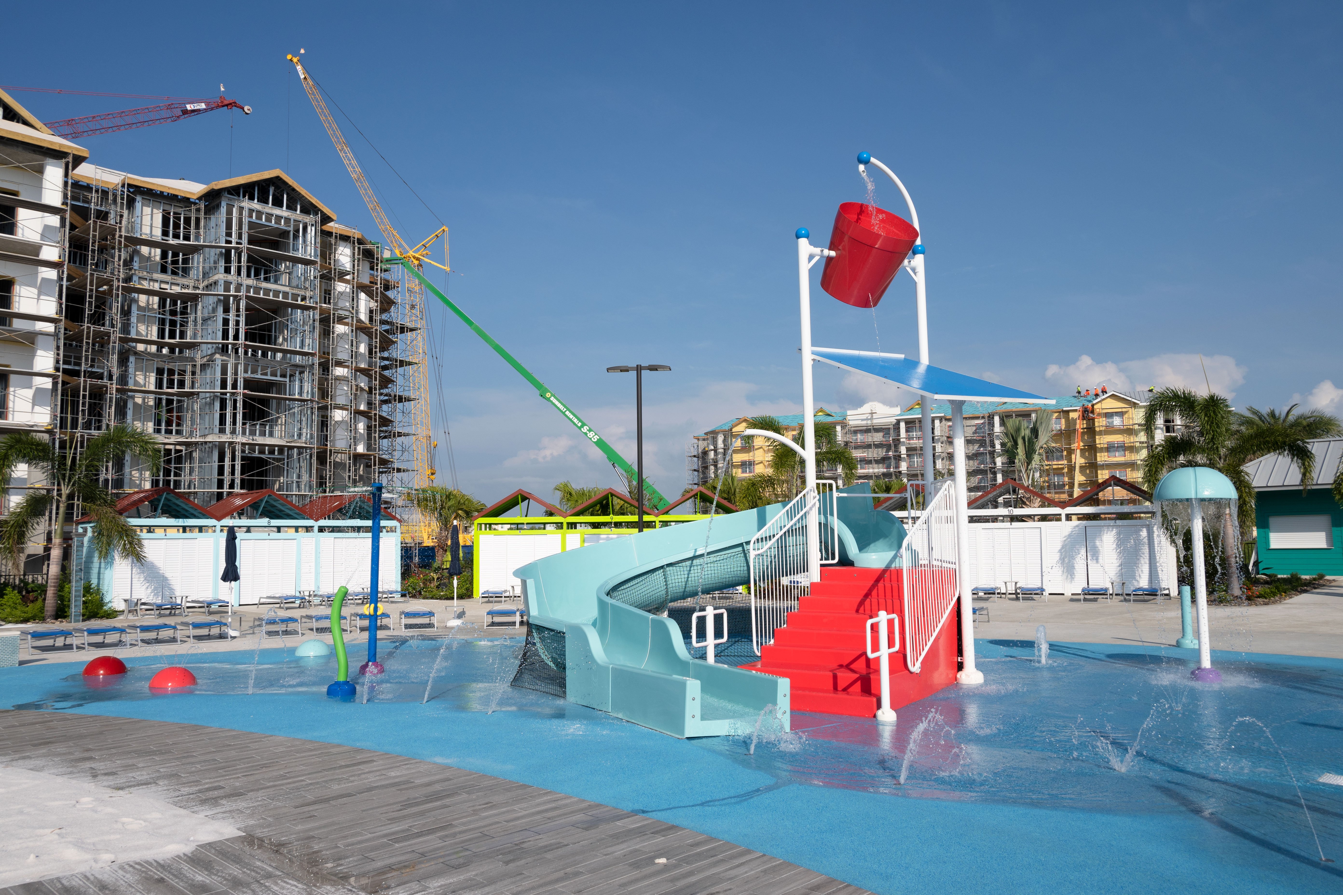 water playground featuring a multi-level water playset with a water slide