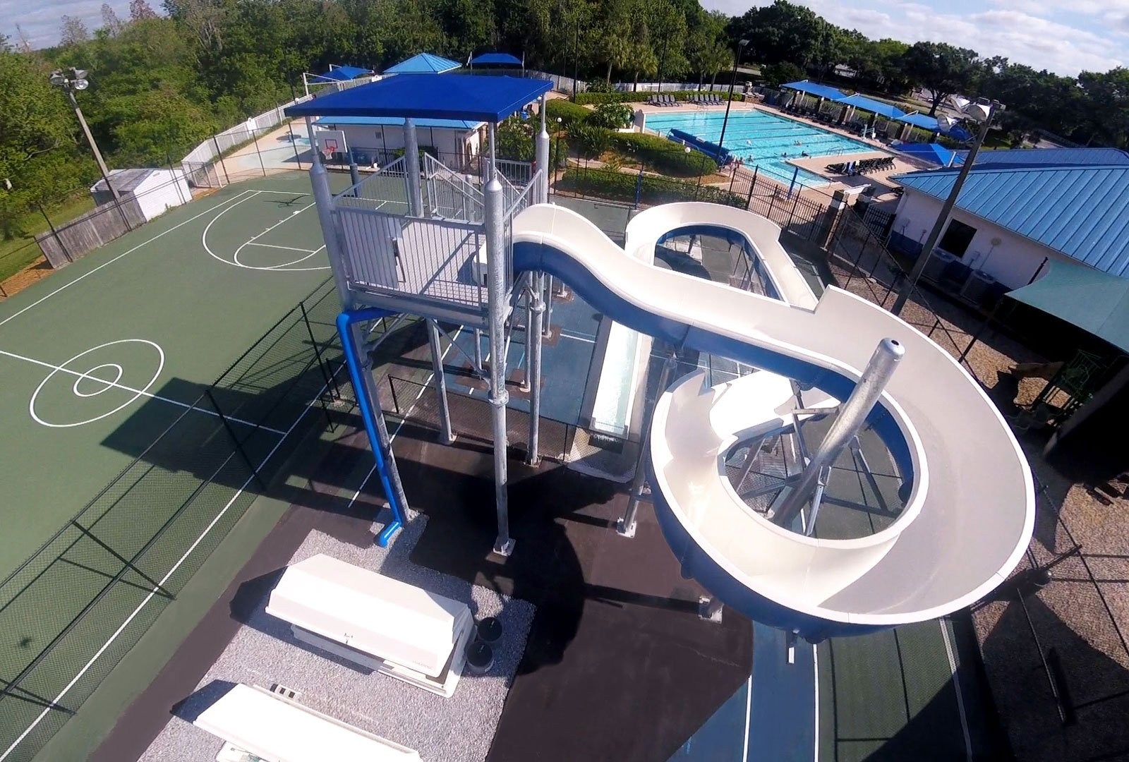 water slide installed on tennis court