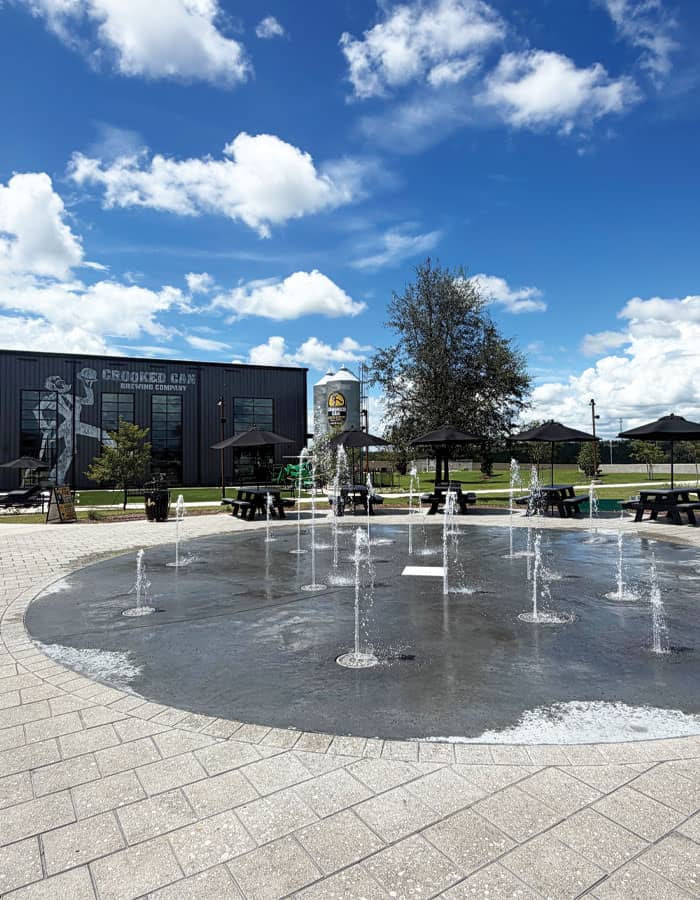 splash pad with ground sprays at an outdoor brewery