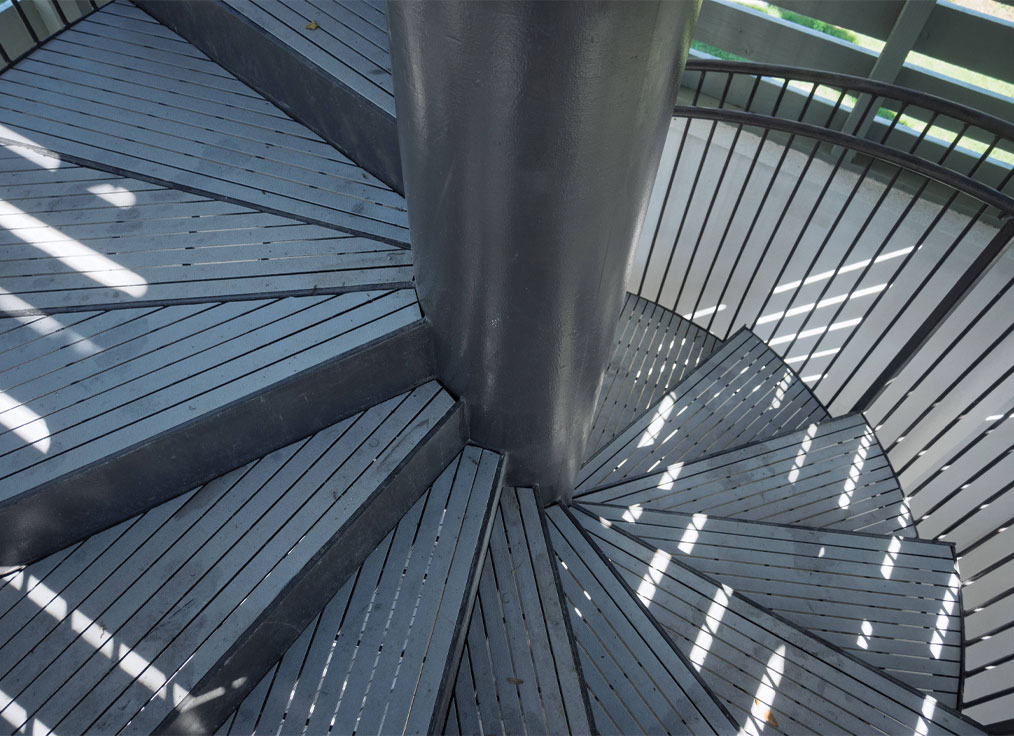 steps of a spiral staircase for a waterslide