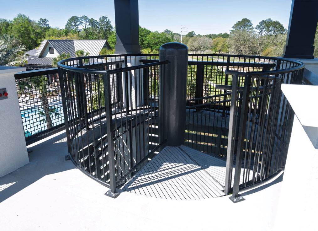entrance to a spiral staircase at the top of a waterslide tower