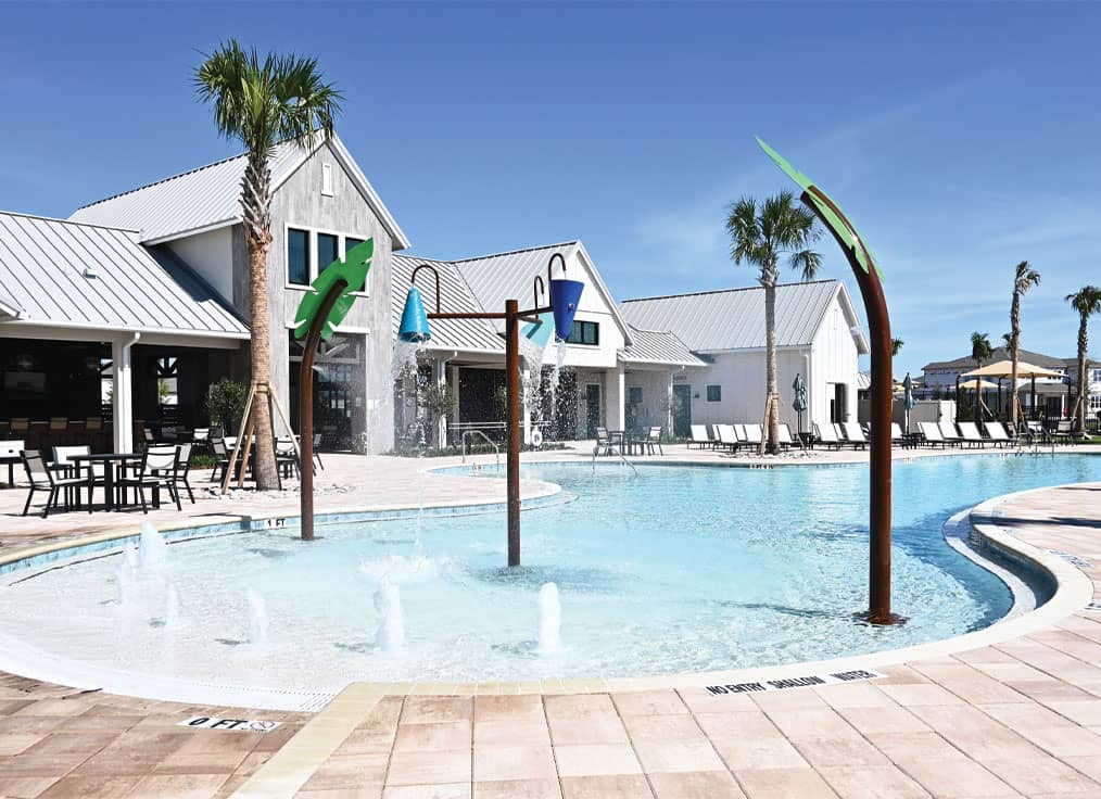 beach entry swimming pool with interactive water features