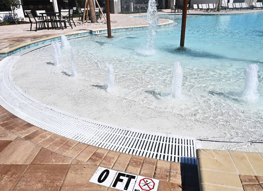 geyser jets in a beach entry swimming pool