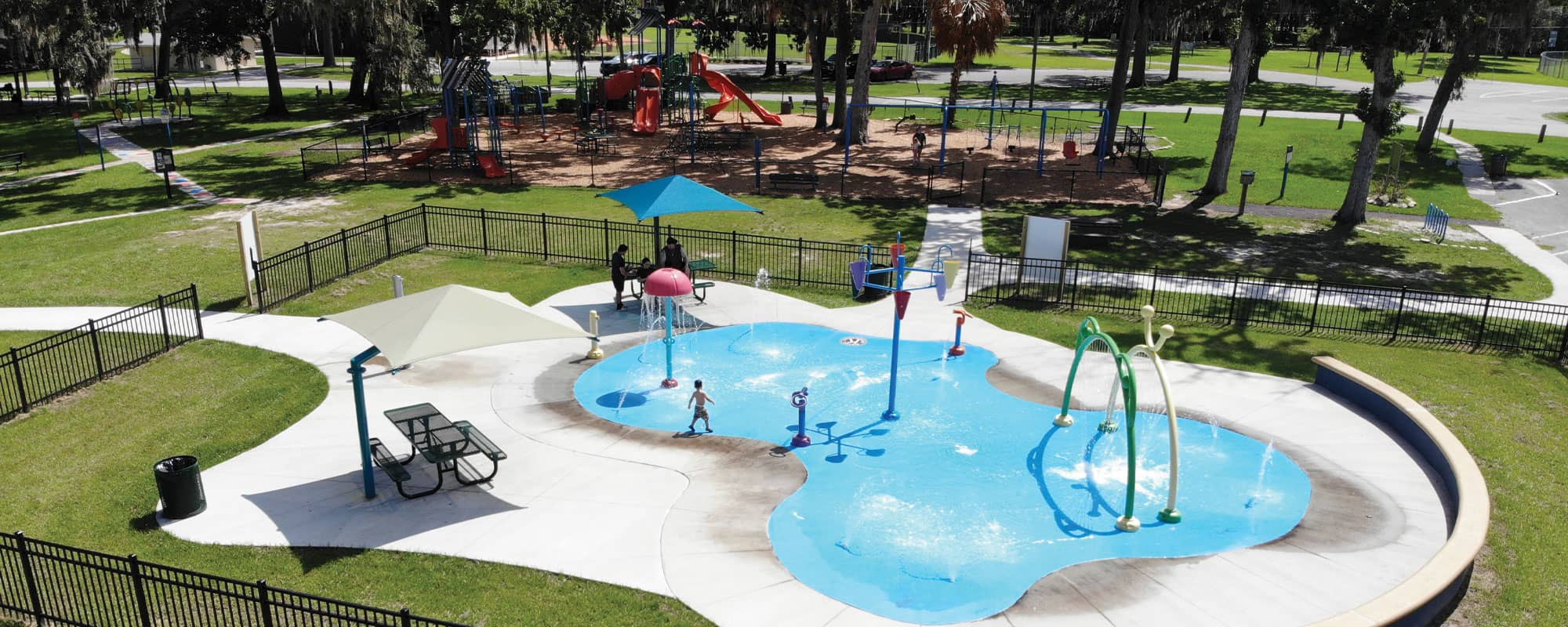 community park master plan design with playground and splash pad
