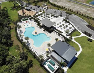 overhead view of swimming pool clubhouse in a master-planned community