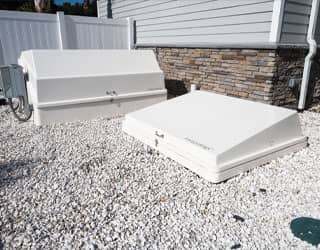 the water slide pumping station is housed in white equipment packs
