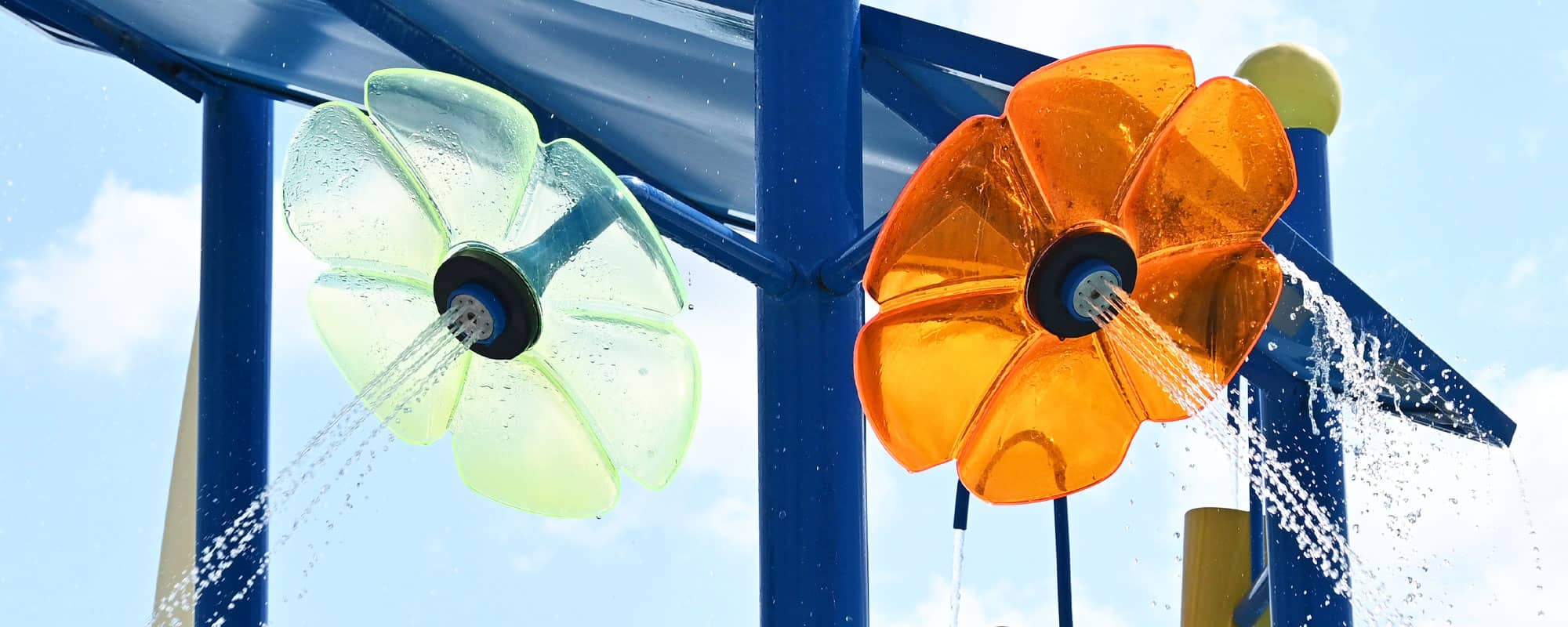 acrylic flower sprayers on a water playset