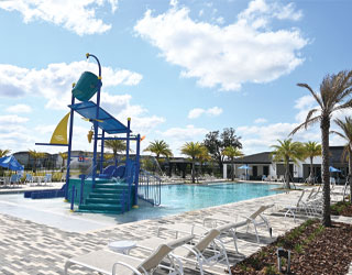 blue multi-level water playset with interactive water features in a swimming pool