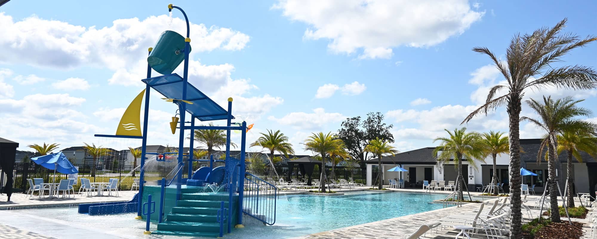 blue multi-level water playset with interactive water features in a swimming pool