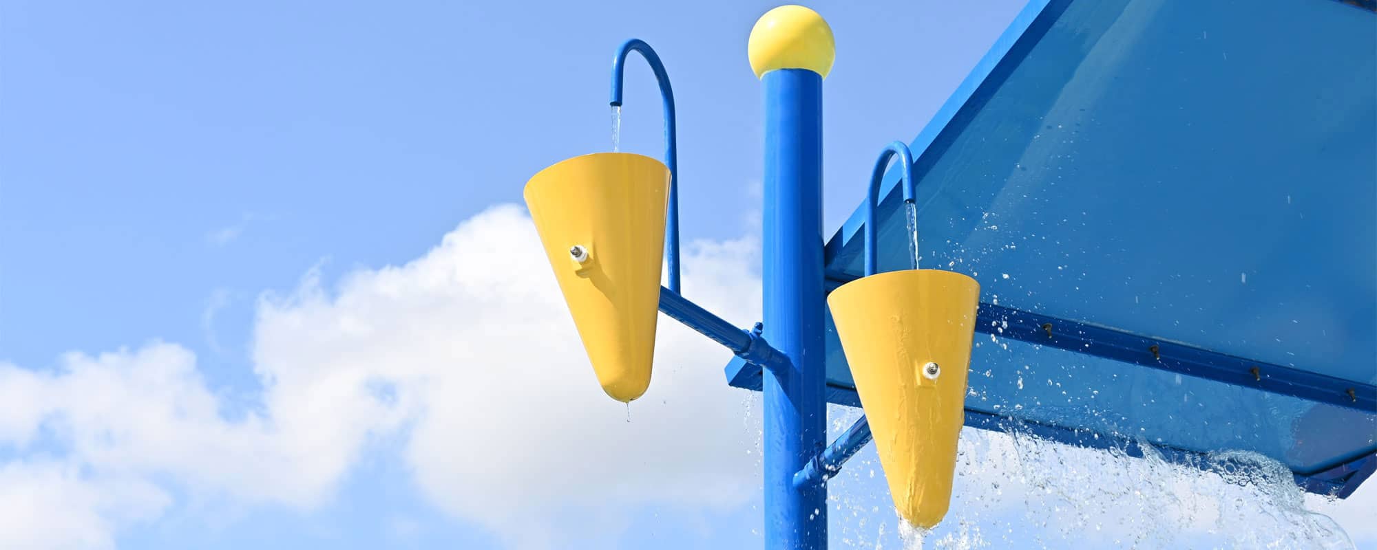 dumping buckets on water playset
