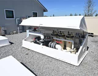 DE filtration system for commercial swimming pool