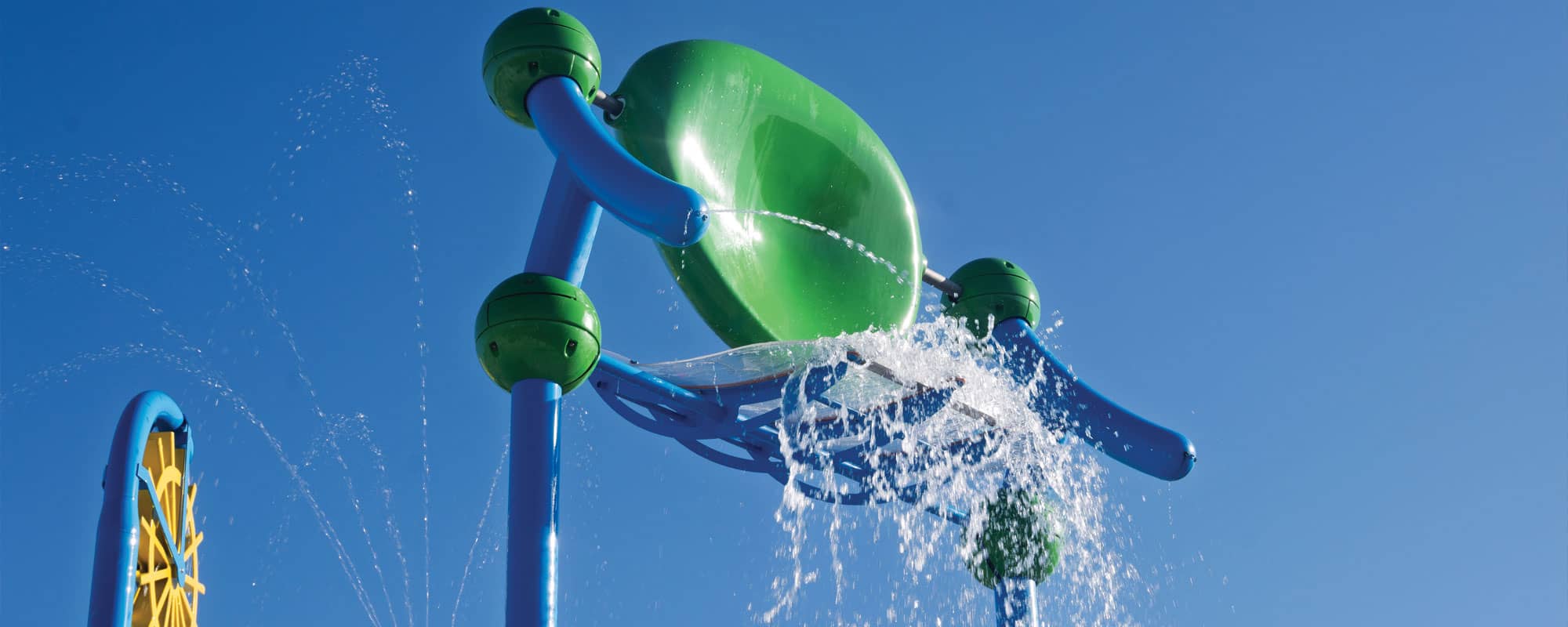 massive splash dumping bucket on a multi-level water playset