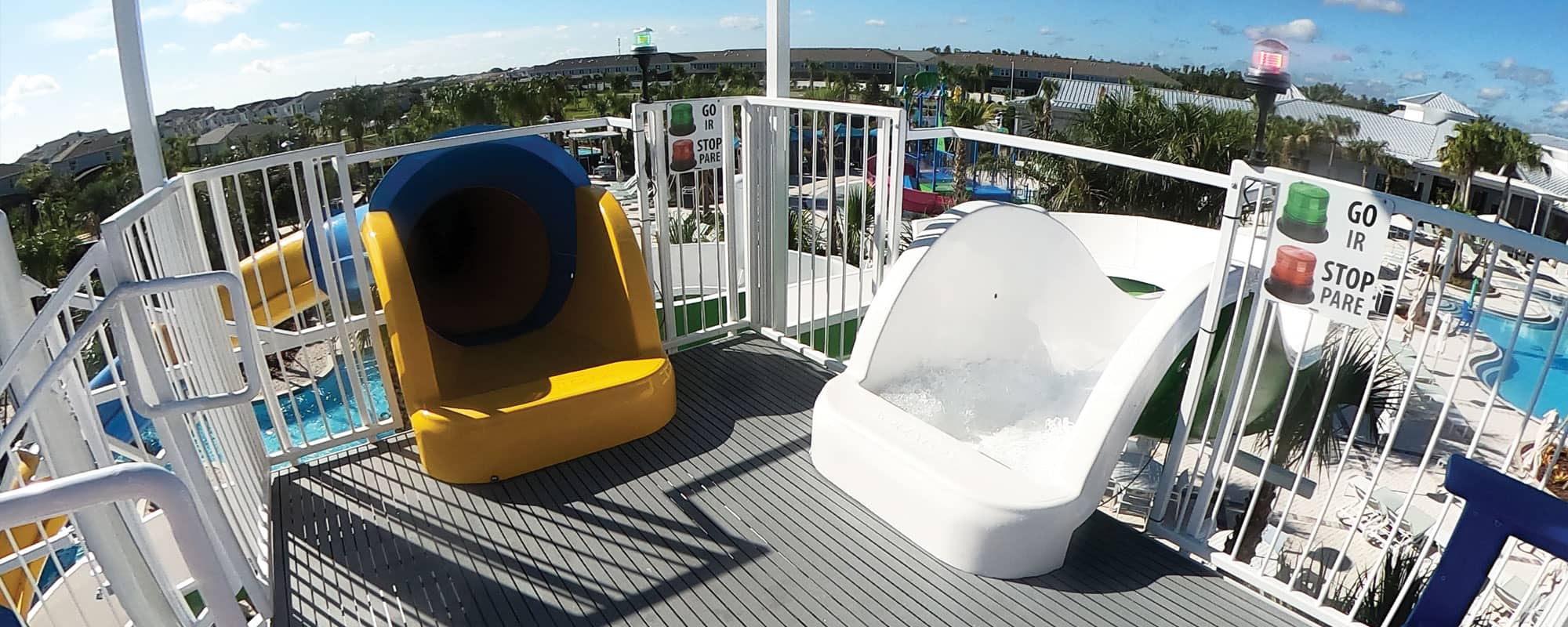 waterslide entrances with red light, green light stop and go system