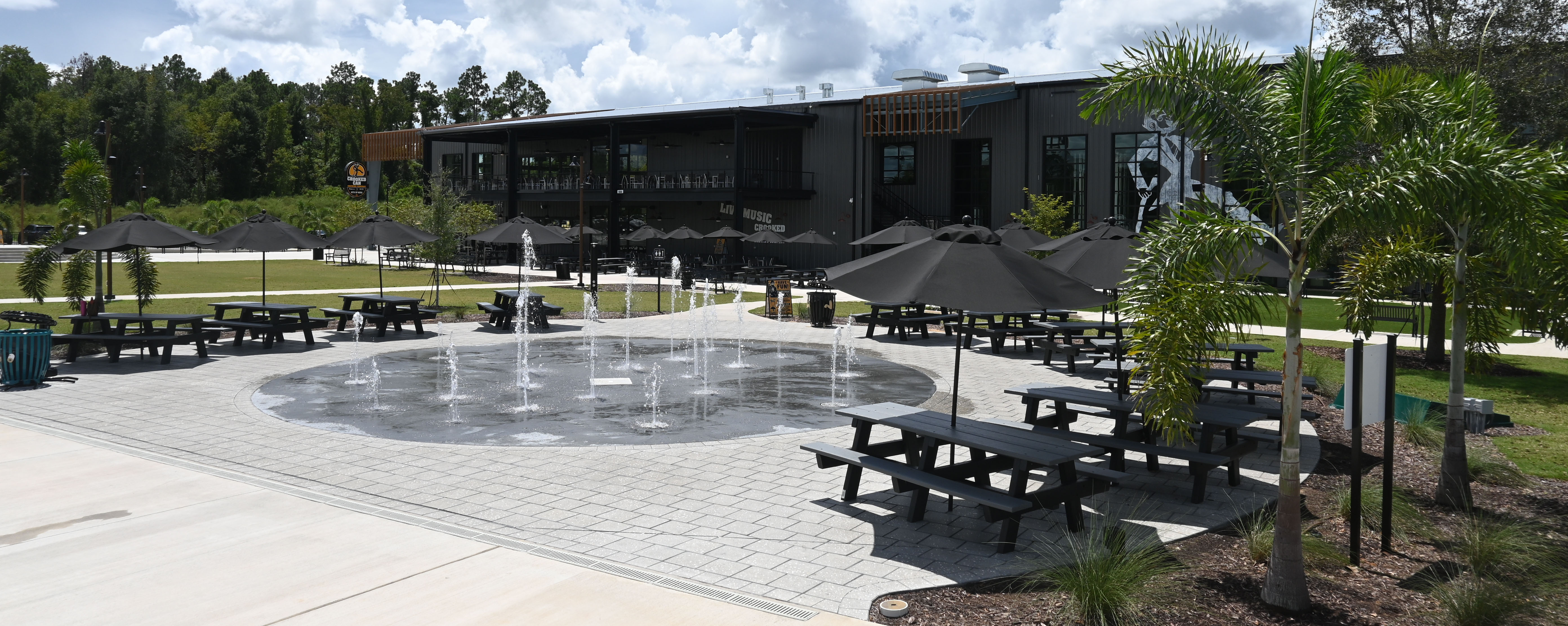 interactive splashground in front of a brewery in central florida