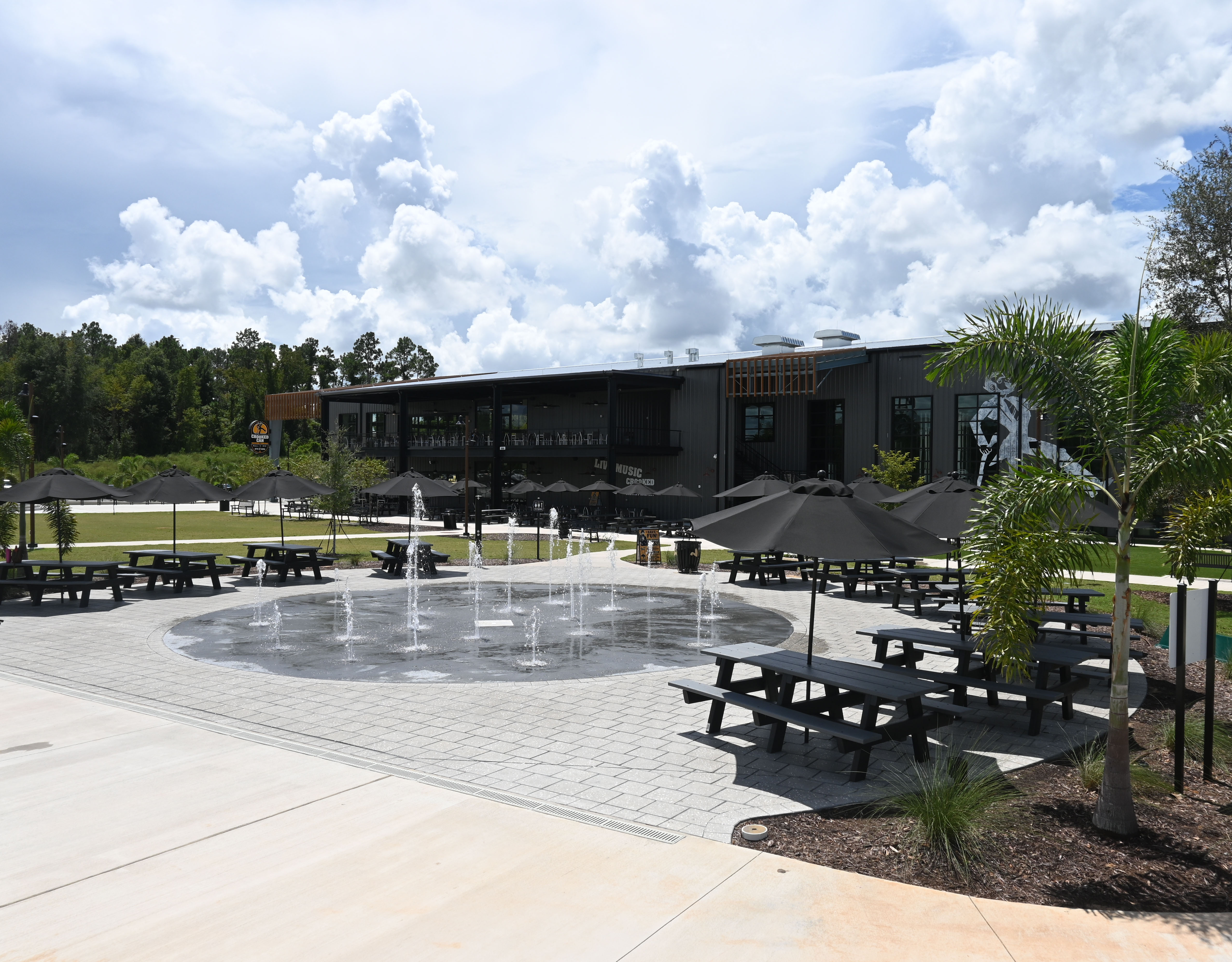 interactive splashground in front of a brewery in central florida